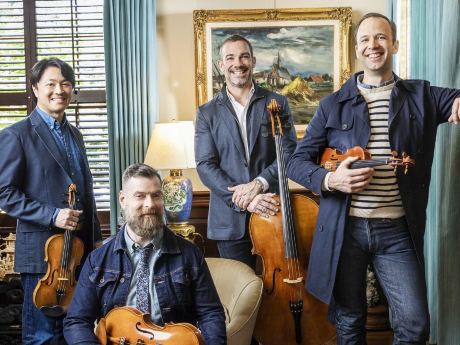 chamber musicians in denim outfits