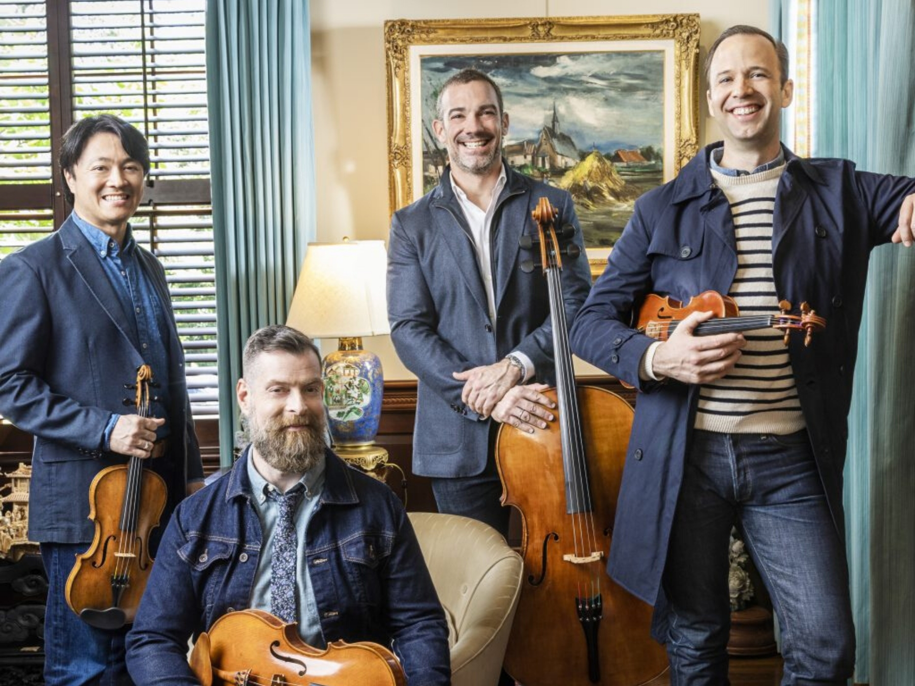 chamber musicians in denim outfits
