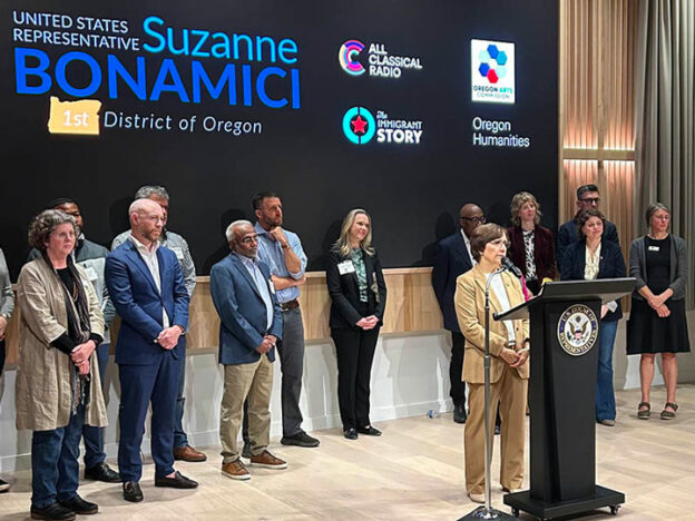 Rep. Suzanne Bonamici, D-Beaverton, stands in the middle of a group of arts leaders at a press conference to defend the NEA and NEH from drastic budget cuts. Photo by Garrett Andrews.