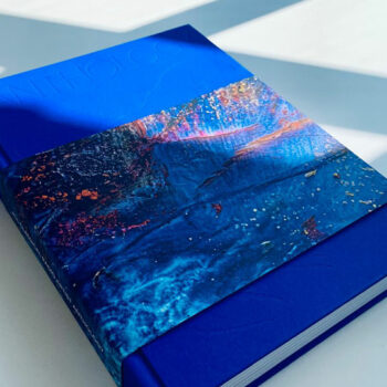 Blue coffee table book with geode dust cover