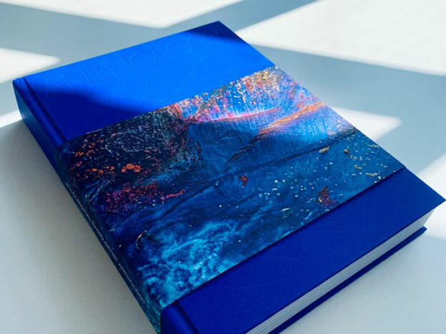Blue coffee table book with geode dust cover