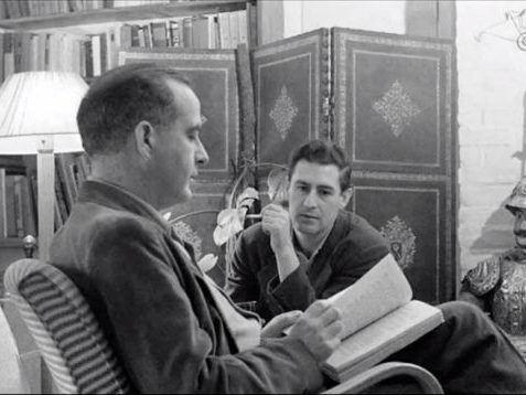 Photo of Barber and Menotti looking at a book